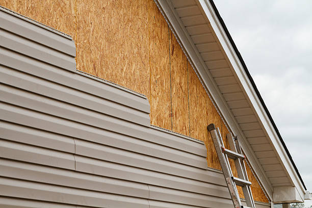 Professional Emergency Siding Repair technician working in Cologne, NJ